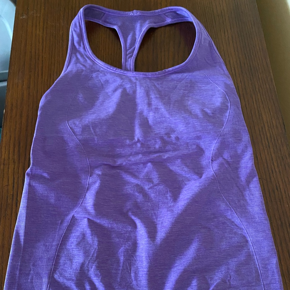 Lululemon Women’s purple swiftly tank with built in bra size 6.